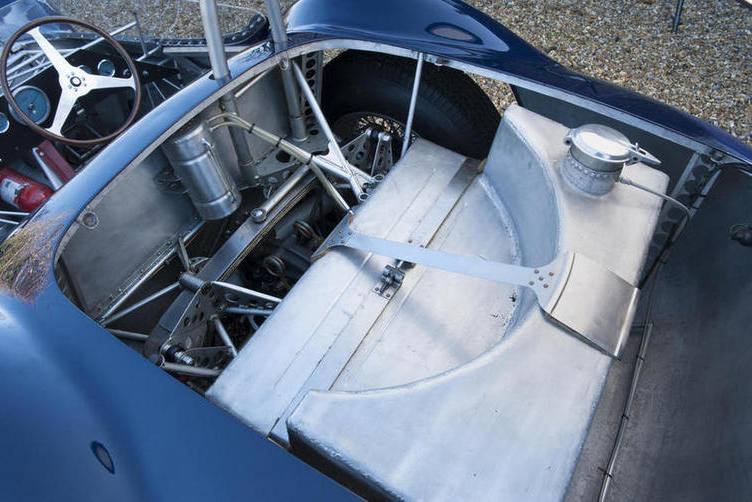 The huge sports racing fuel tank makes this car a "flying fuel dump". Provision for the spare tire is simple and effective.
