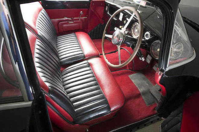 The interior of the restored Antem bodied Type 101C is in a tasteful red and black that compliments the car's paintwork beautifully.