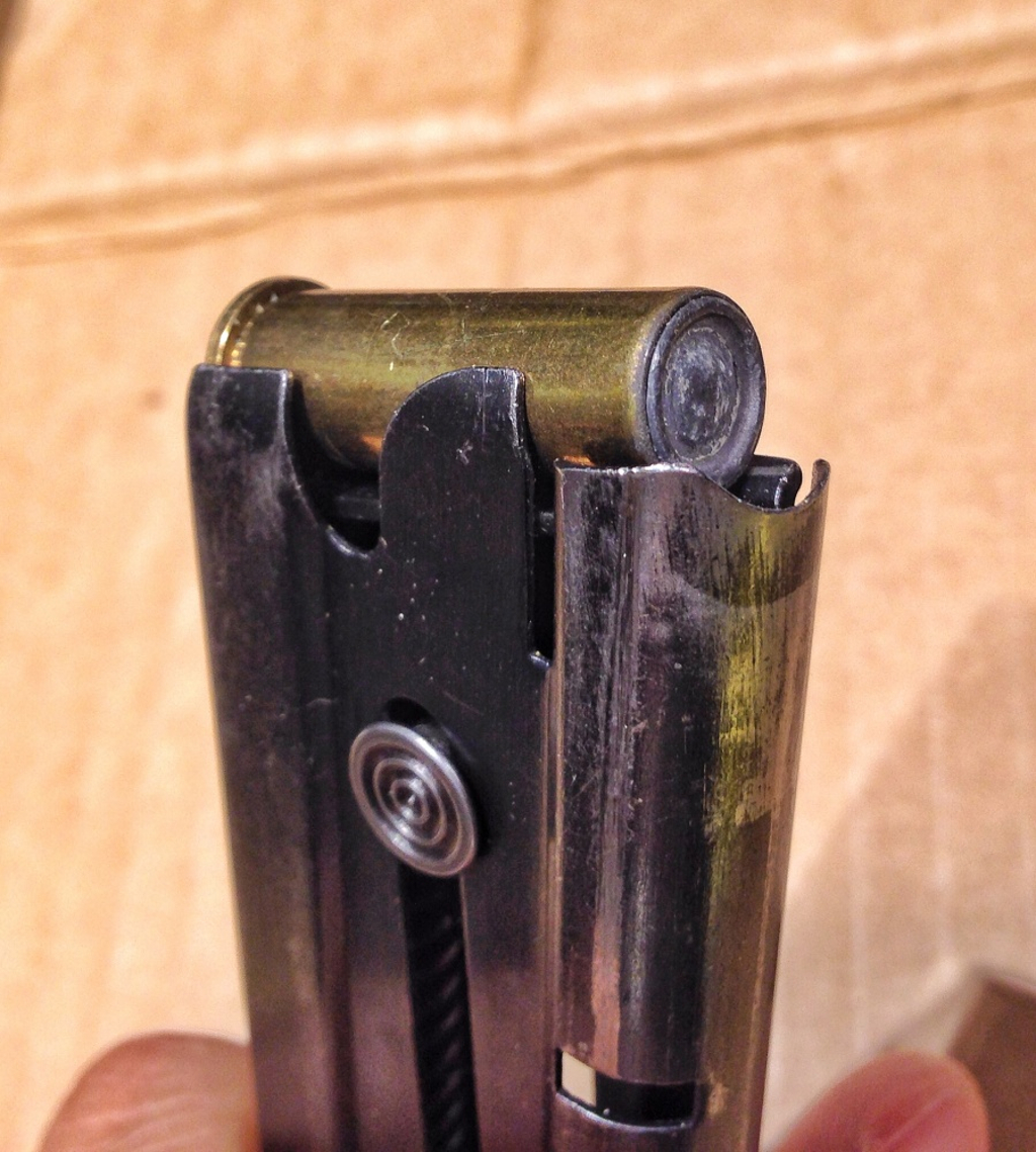 A .38 Special Mid-Range wadcutter cartridge in the magazine of the Colt Gold Cup. The flat nosed cartridge even with a roll crimp is not going to feed reliably unless alignment is near perfect. (Picture courtesy thefirearmblog.com)
