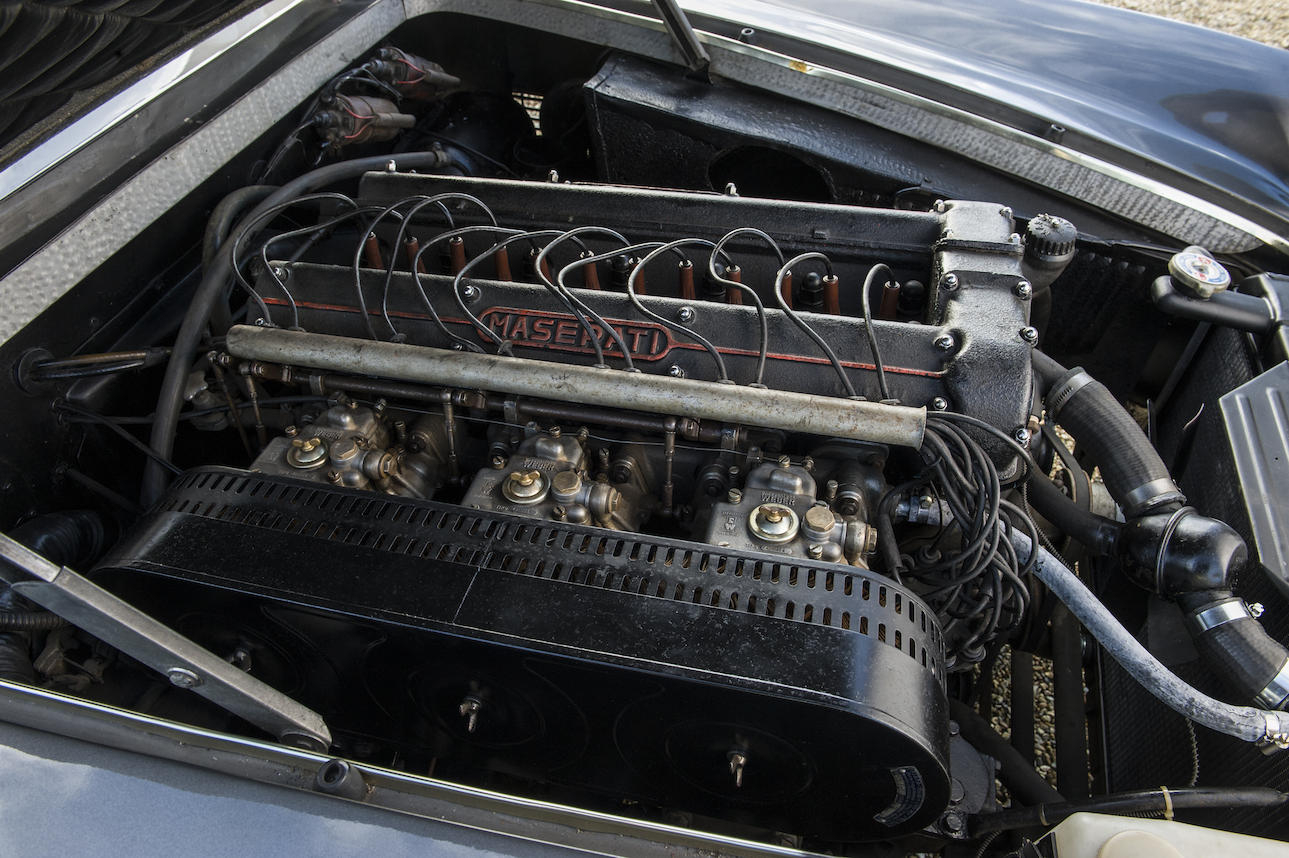 The triple Weber 42 DCOE carburettors are fed from dual Marelli fuel pumps. (Picture courtesy Bonhams).