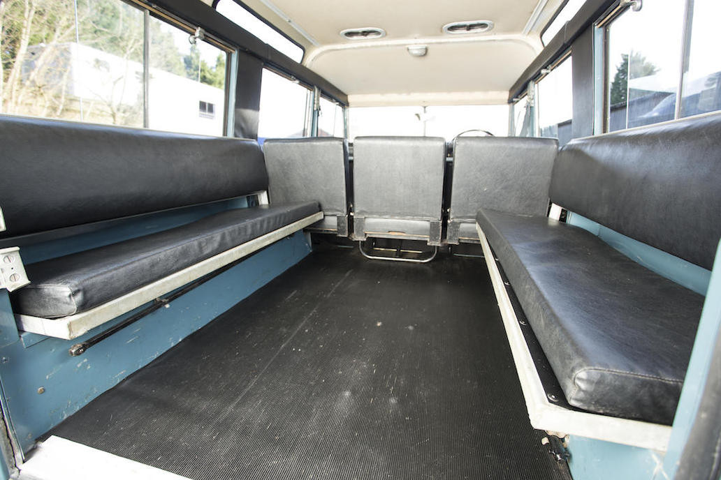 The four occasional seats in the rear of the Land Rover Safari station wagon are not recommended for transcontinental journeys, just for shorter ones. (Picture courtesy Bonhams).