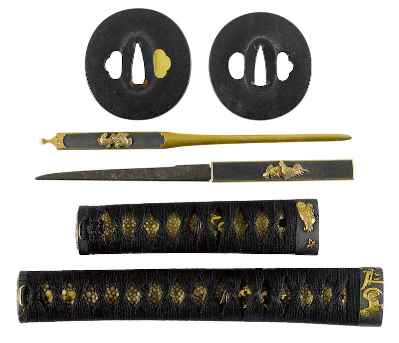 This set of koshirae is very attractive in its contrast of colours and the simplicity of the cast iron tsuba. (Picture courtesy Bonhams).