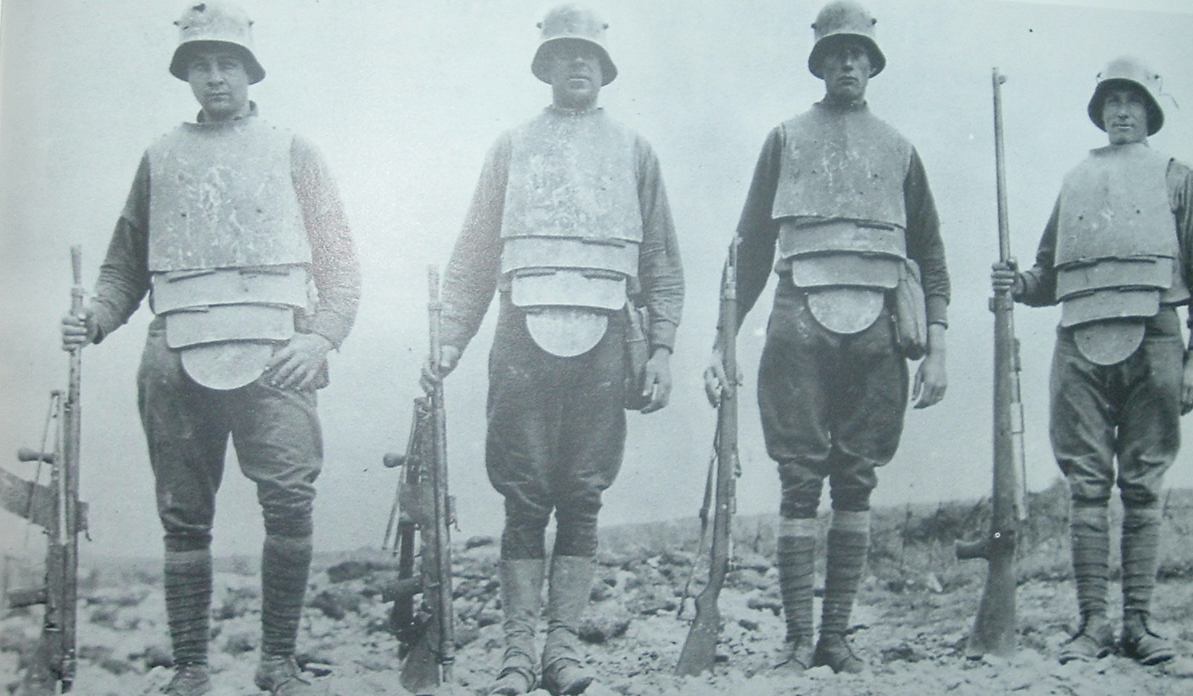 A German anti-tank team with Grabenpanzer body armour. The two on the left are armed with French Chauchat light machine guns, the next with a standard Gewehr 98, and the gentleman on the right with a T-Gewehr. (Picture courtesy whisky-wolf.tumblr.com).