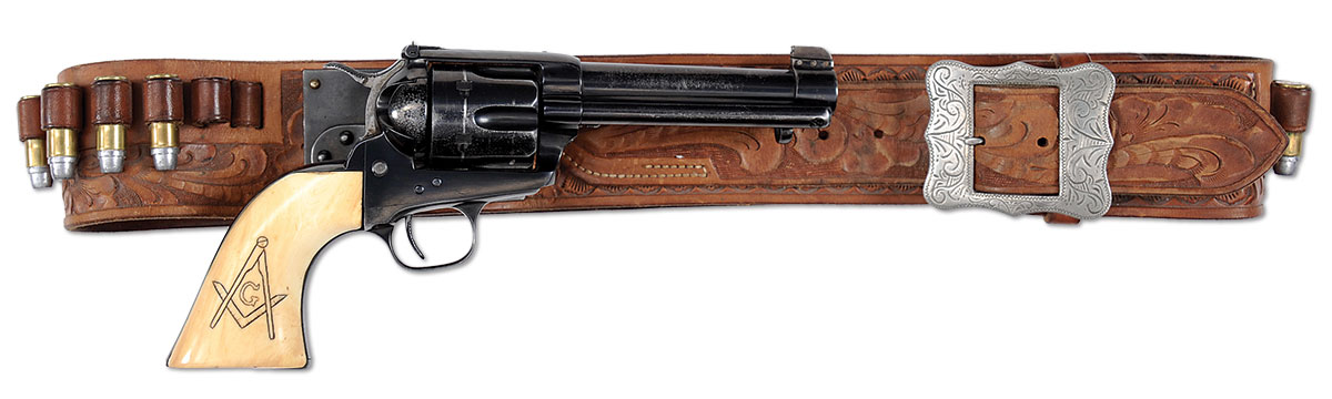 Having blown up one Colt SAA Elmer Keith moved into modified Colts this one being a .44 Special with Smith & Wesson rear sight and front sight attached by a barrel band. (Picture courtesy gunsandammo.com).