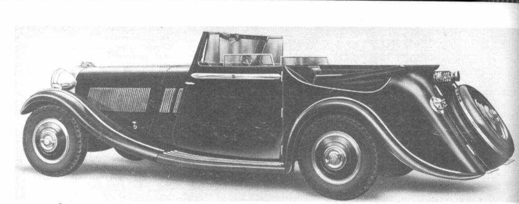 1936 picture of the drophead coupé Brough Superior 4.2 liter eight. The cover folds down flush with the body line. (Picture courtesy motorsportmagazine.com).