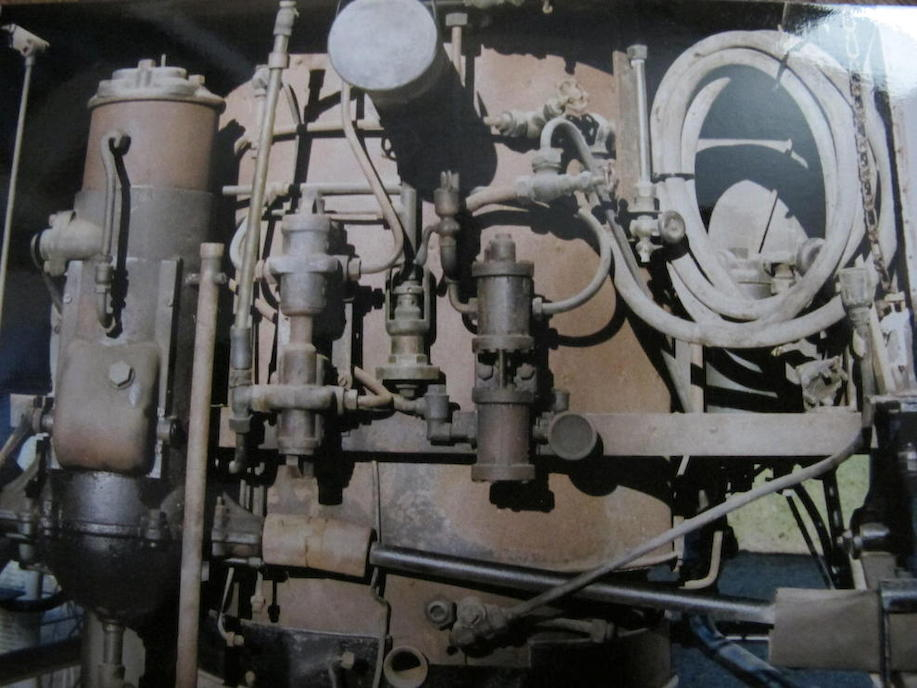 The boiler and engine of the 1897 Hart steam car before restoration.