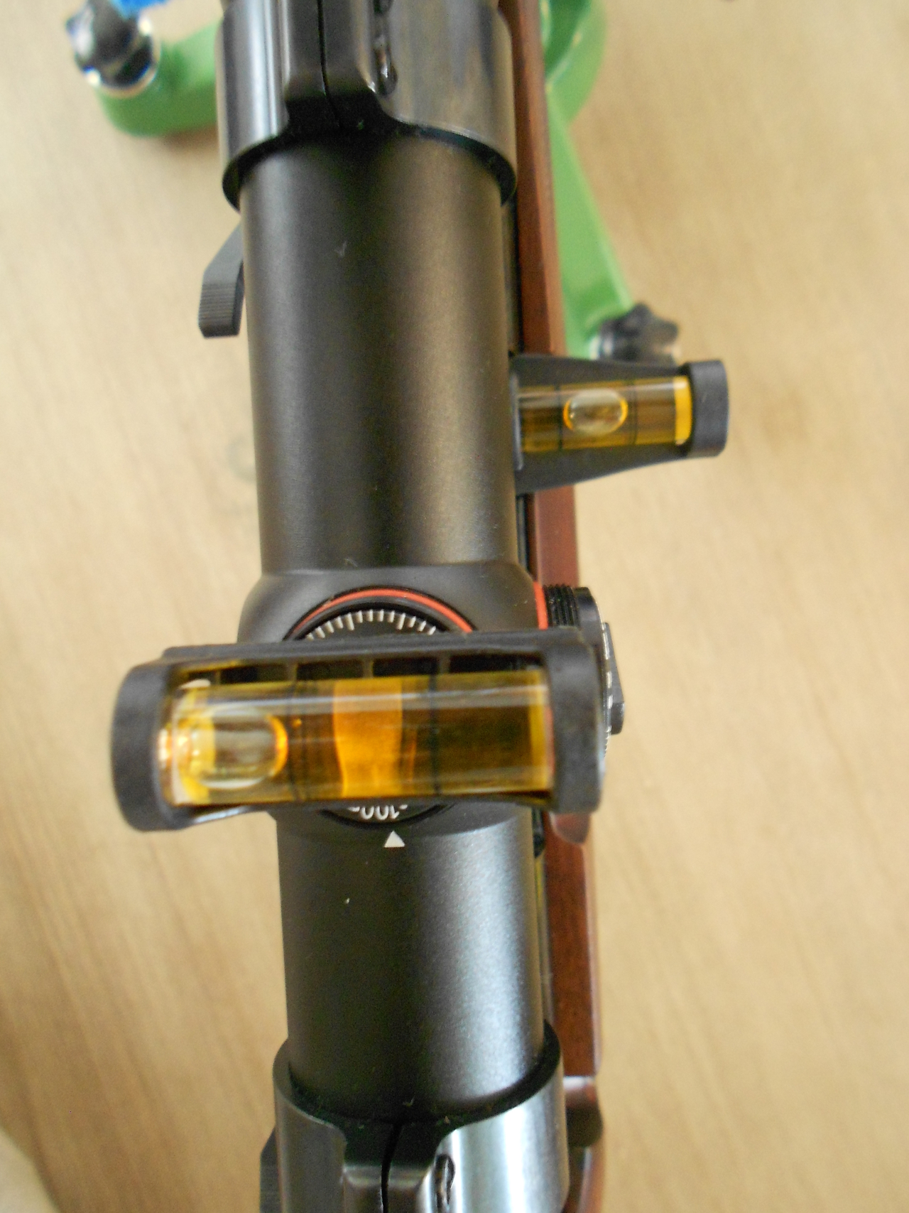 With the Wheeler Engineering Level-Level-Level it is possible to accurately determine if a rifle-scope is mounted level with the action. By comparing the lower spirit level which shows the action is level we can compare with the upper spirit level mounted on the rifle-scope elevation adjustment knob. In this photo we can tell that the rifle-scope is leaning to the right and is not level.