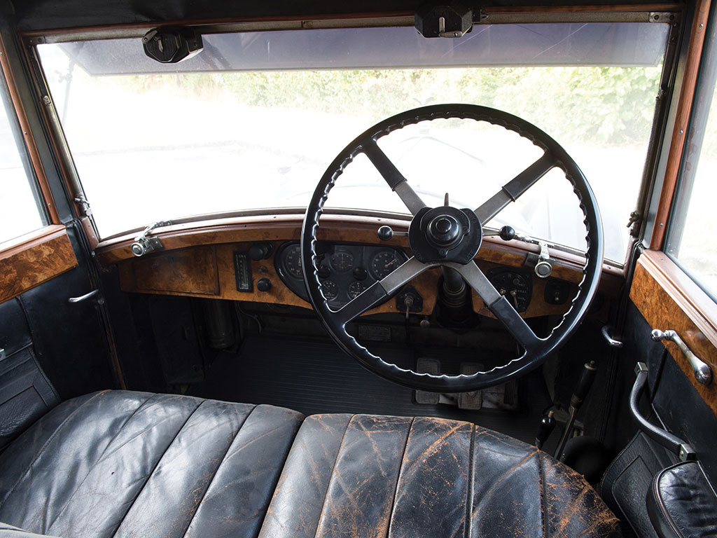 The chauffeur's section of the Rolls-Royce Phantom II is rather more businesslike than the rear passenger compartment but the wood dashboard and engineer's instrumentation are both practical and aesthetic.
