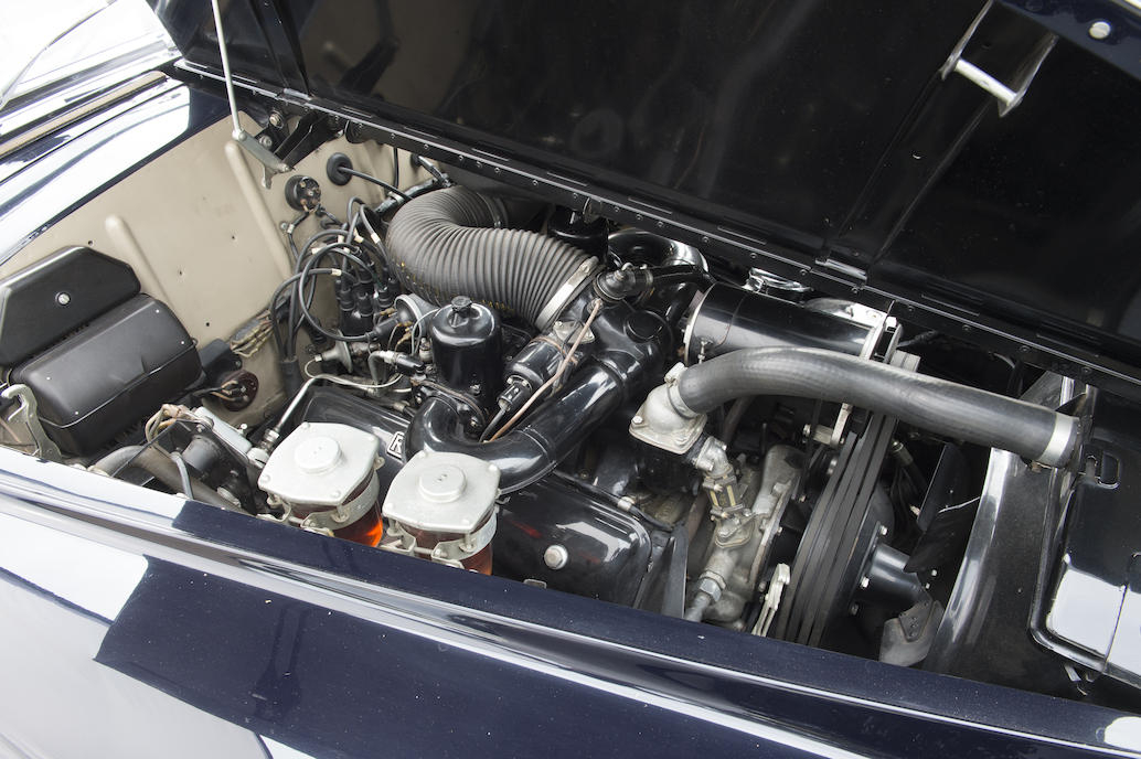 The 6.2 liter Rolls Royce V8 engine breathes through twin SU carburettors.