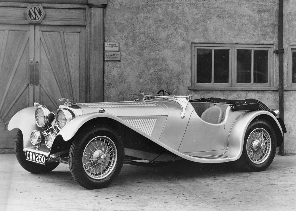 Car registration number CKV250 was the first recorded SS car to wear the "leaping Jaguar" mascot.  It is seen here in 1937 outside the SS Cars factory which would become Jaguar Cars after the Second World War in 1945. (Picture courtesy Wikipedia).
