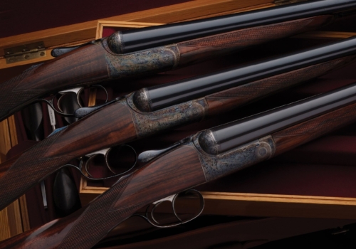 Trio of C. Lee Engraved David McKay Brown Round Body Shotguns